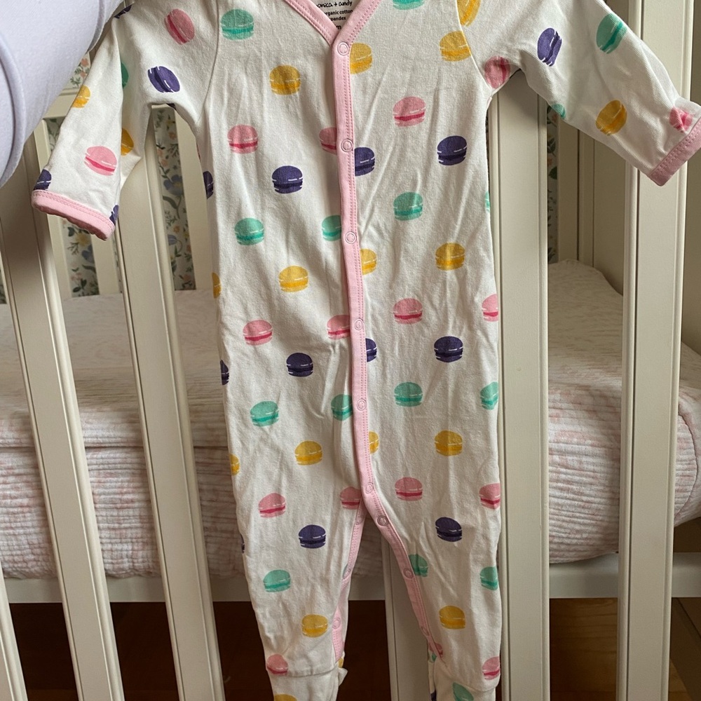 Monica + Andy macaroon onesie